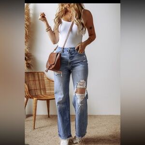 1010. Distressed straight leg high rise denim